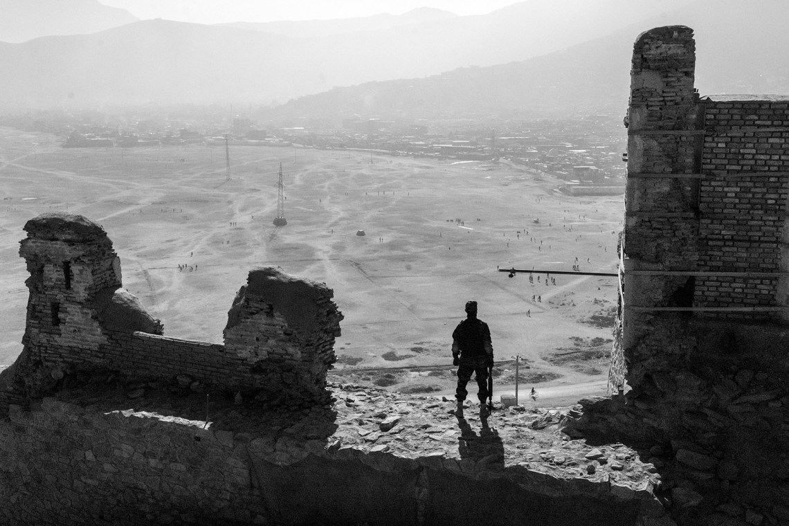 A Taliban soldier standing on the ruins of the Bala Hissar fortress, Kabul